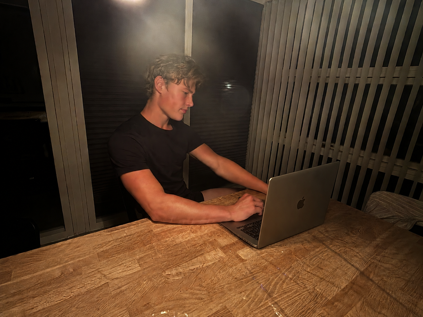 Michael Seierø working at a laptop